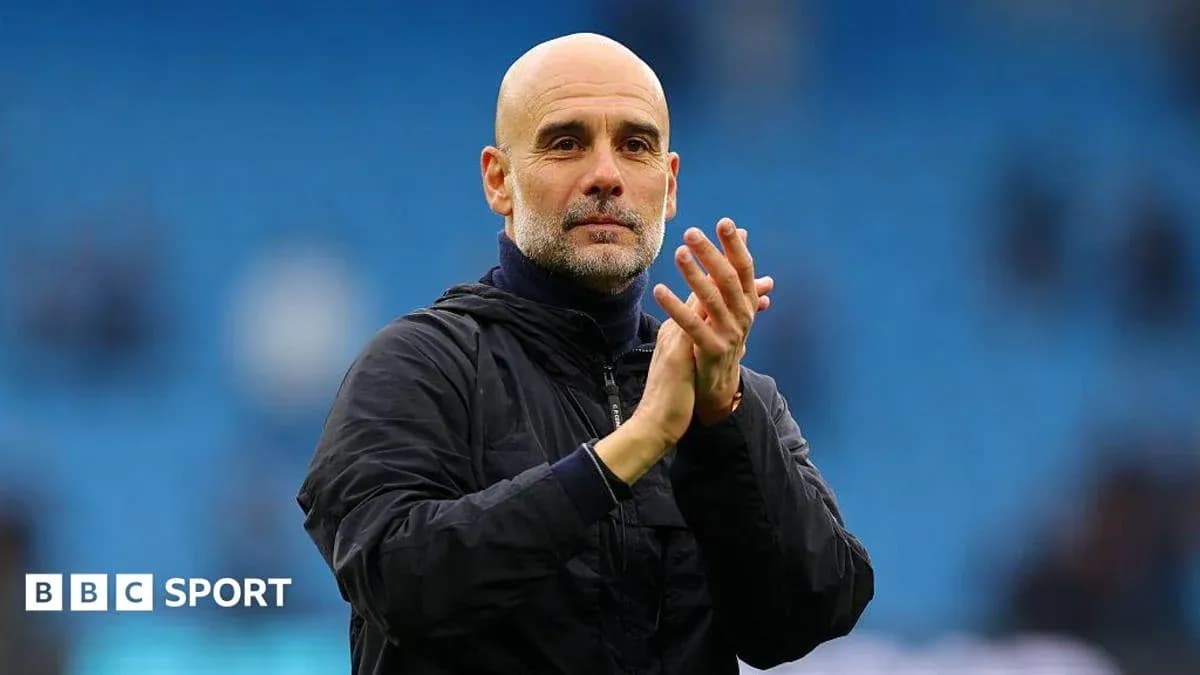 Manager applauding fans after the match