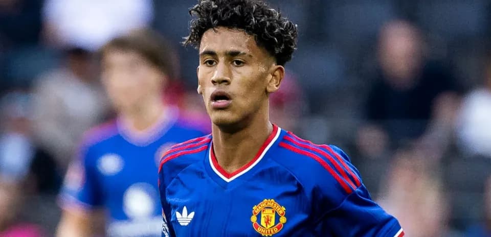 Young player in Manchester United jersey on field