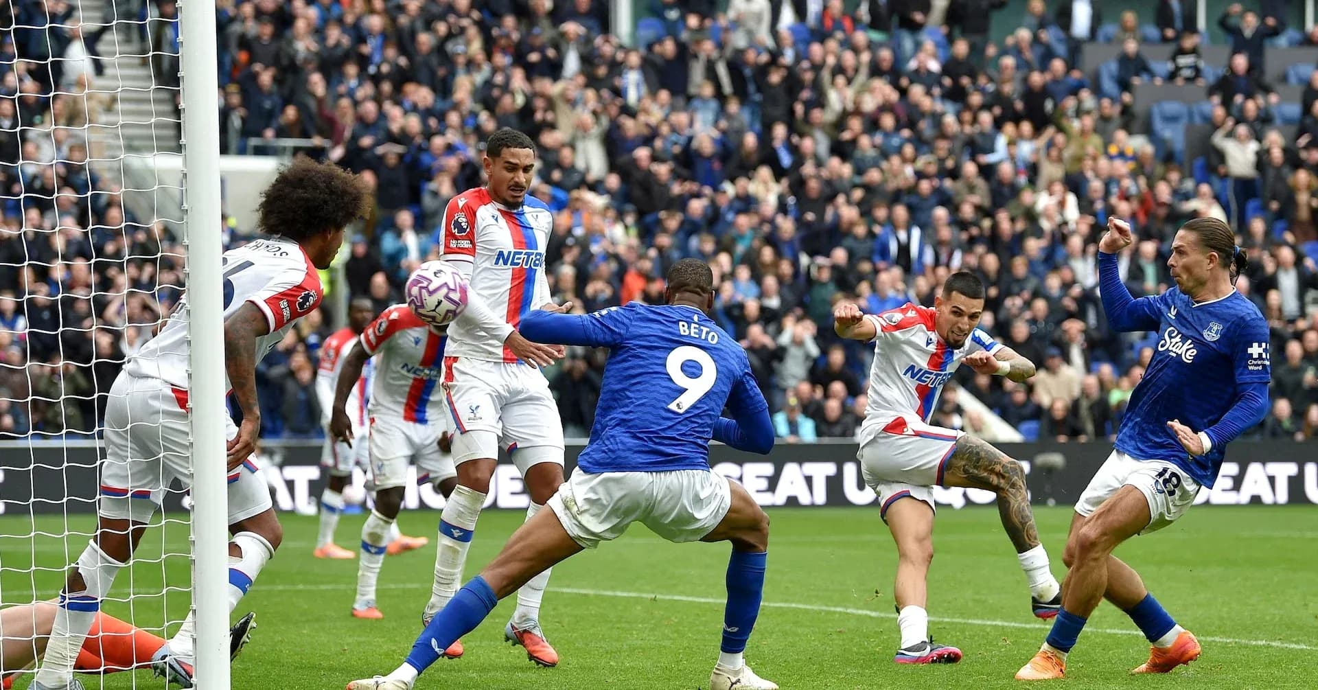 Players contesting for the ball in match action