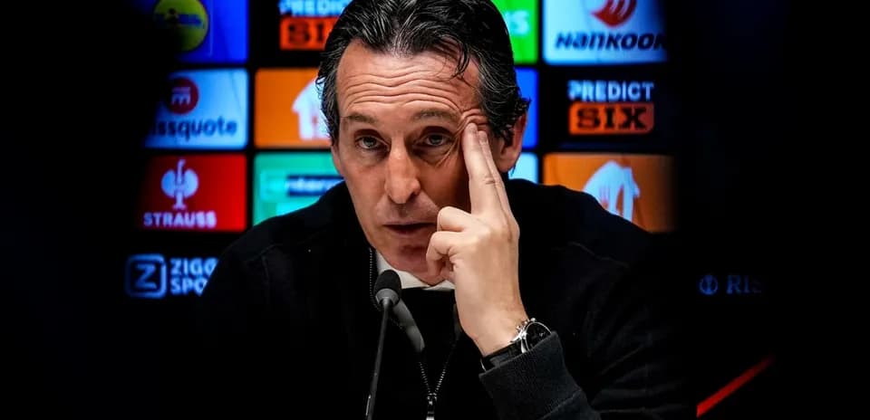 Manager speaking at press conference with logos behind