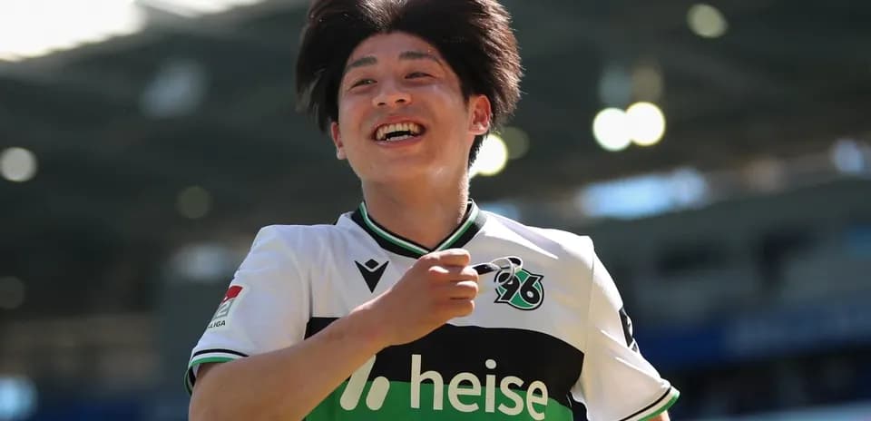 Player celebrating a goal on the field