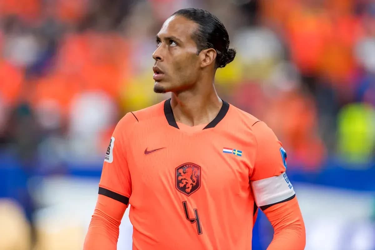 Player in orange jersey looking up on field