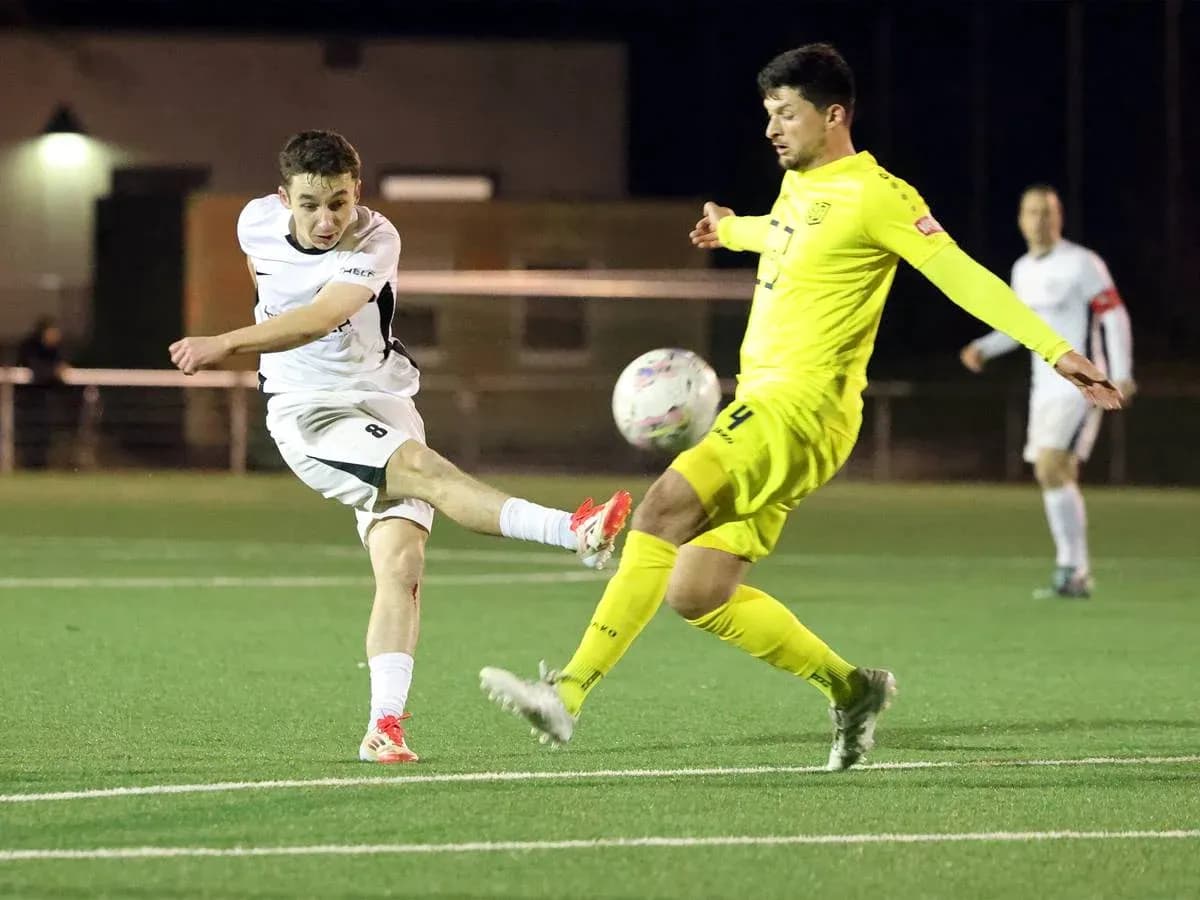Player shooting on goal during SC St. Tönis match