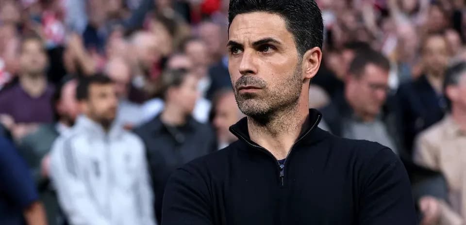Coach observing the match from the sidelines