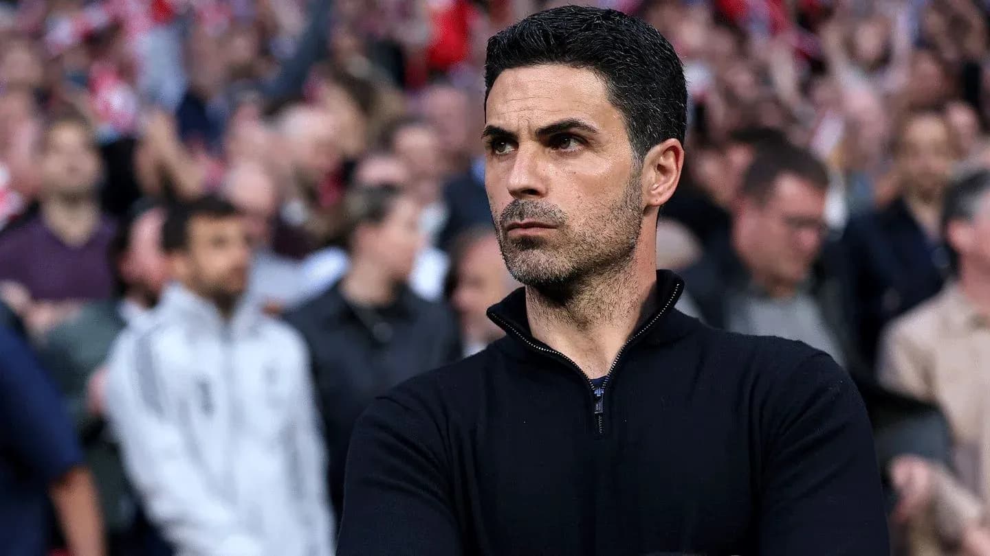 Coach observing the match from the sidelines