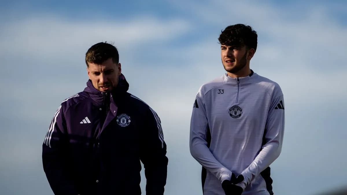 Two Manchester United players walking on training ground