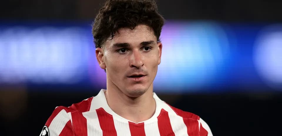 Player in Atlético Madrid jersey during match
