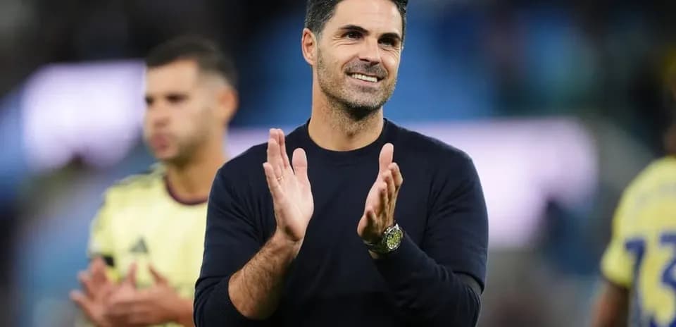 Manager applauding after the match