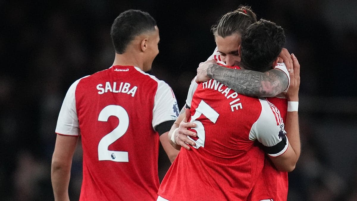 Arsenal players celebrating a goal during match