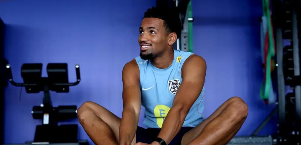 Player stretching during training session in gym