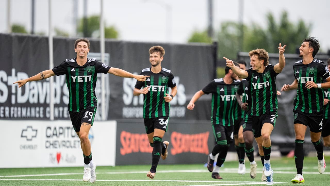 Austin II players celebrating a goal during match