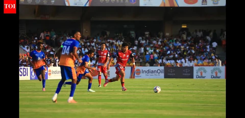 Players competing for the ball during a football match