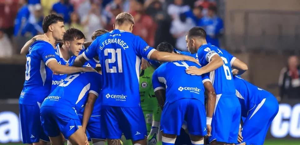 Cruz Azul players in a huddle before match