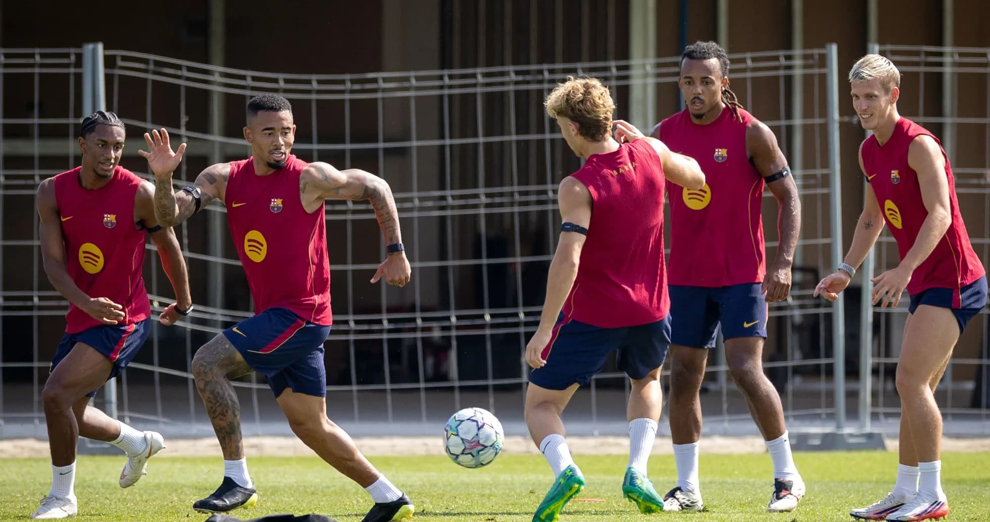 Barcelona players training with a soccer ball