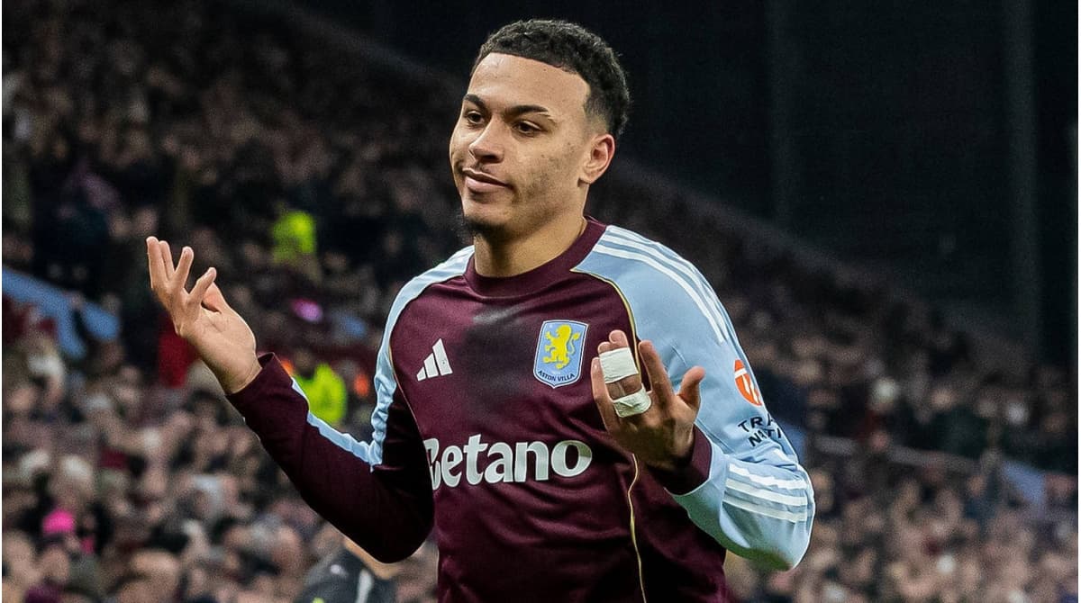 Aston Villa player gesturing during a match