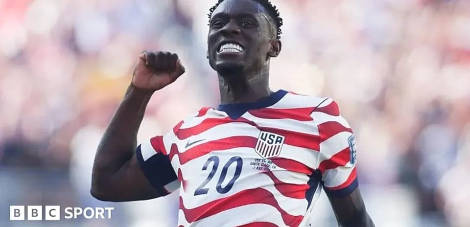 Player celebrating in USA jersey during match