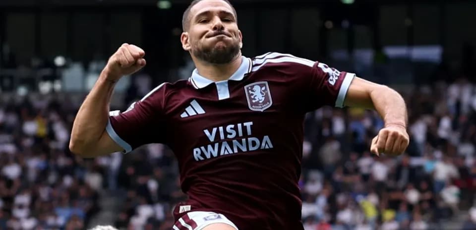 Player celebrating a goal in Aston Villa jersey
