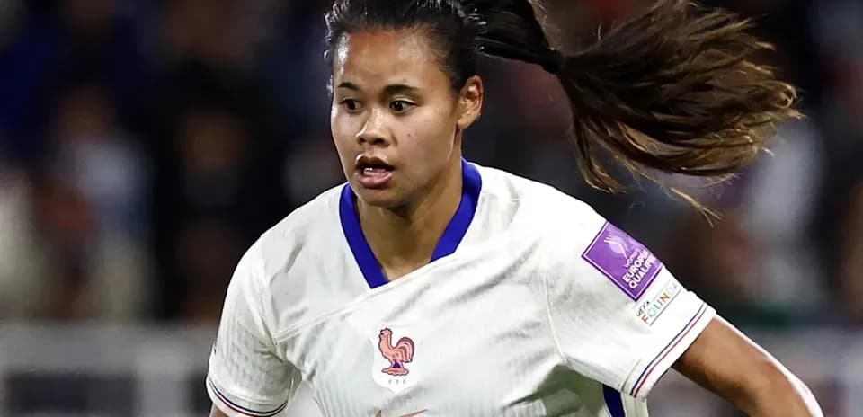 Player in action during a women's football match