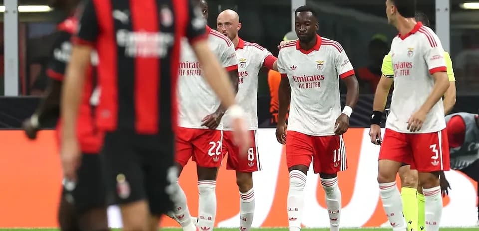 Benfica players celebrating a goal against AC Milan