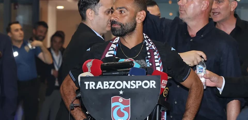 Player speaking at Trabzonspor press conference podium