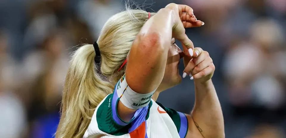 Athlete adjusting headband during competition