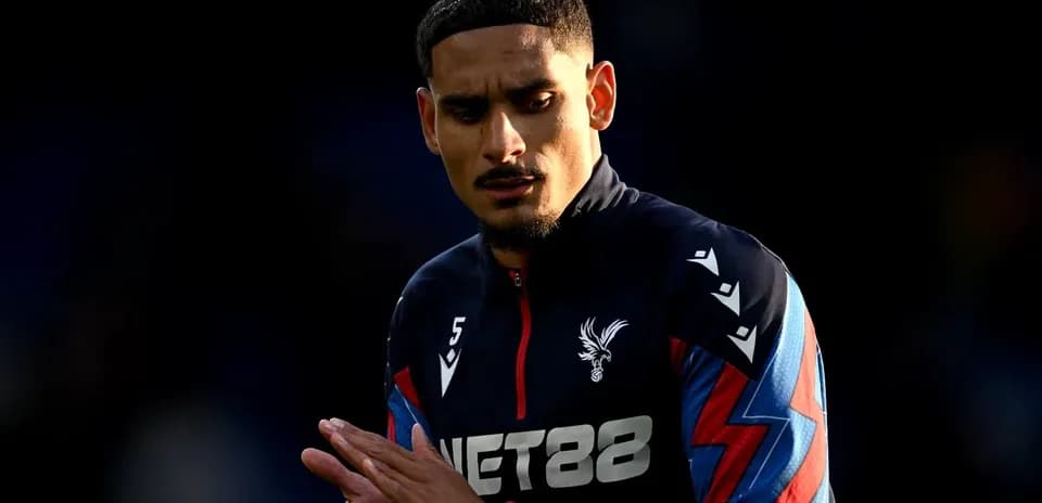 Player in Crystal Palace kit during match preparation