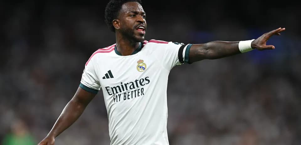 Player gesturing during a match for Real Madrid