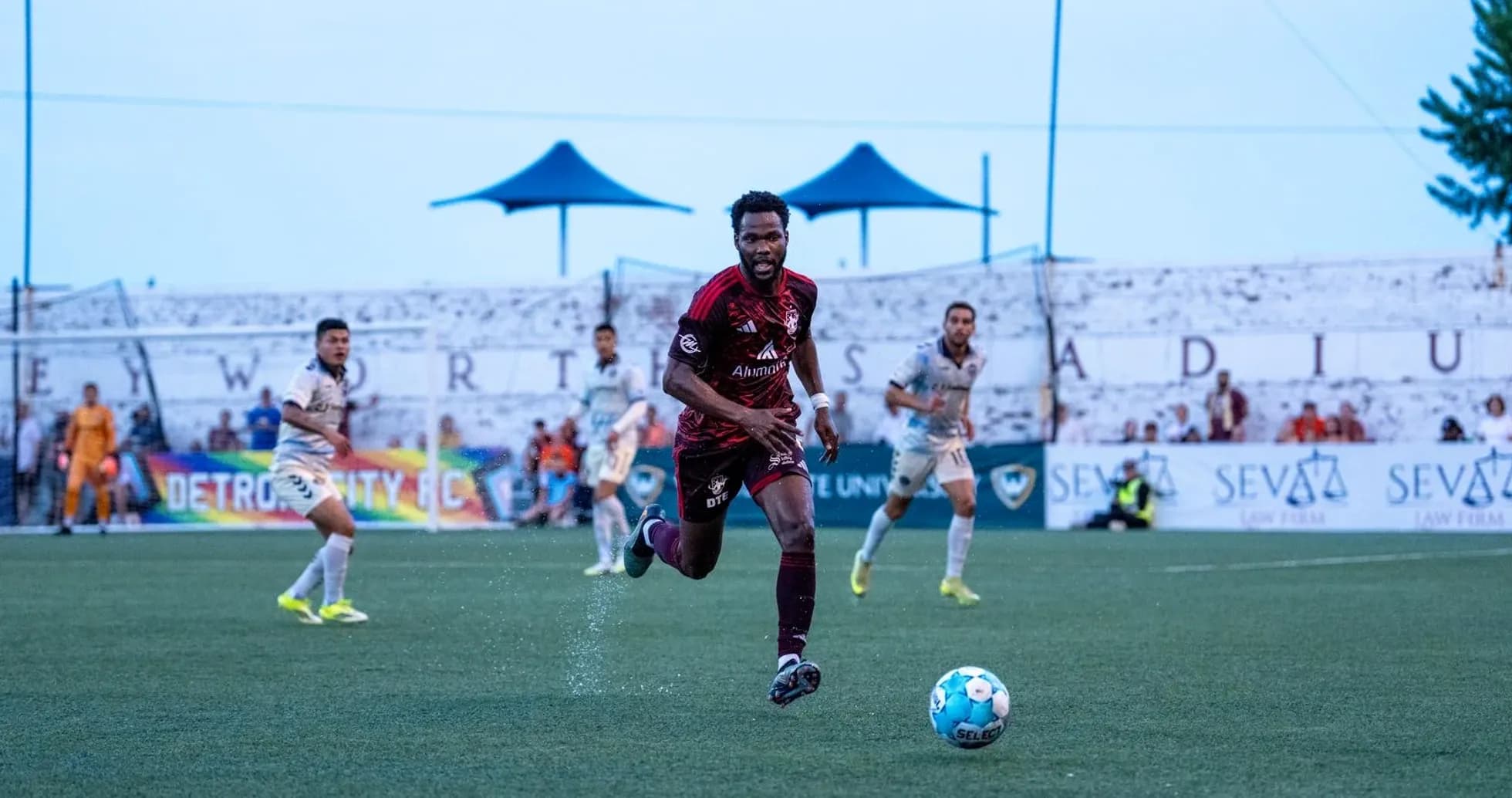 Detroit City player chasing the ball