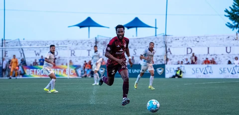 Detroit City player chasing the ball