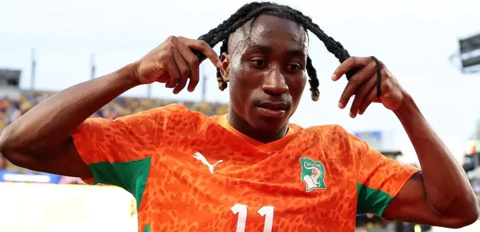 Player adjusting his hair after a match