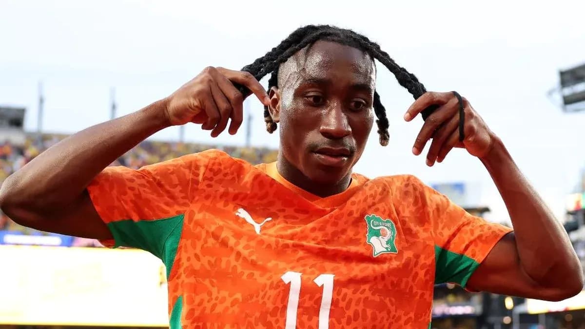 Player adjusting his hair after a match