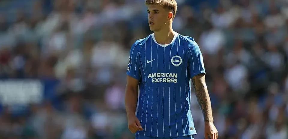 Player in blue Brighton kit on the pitch