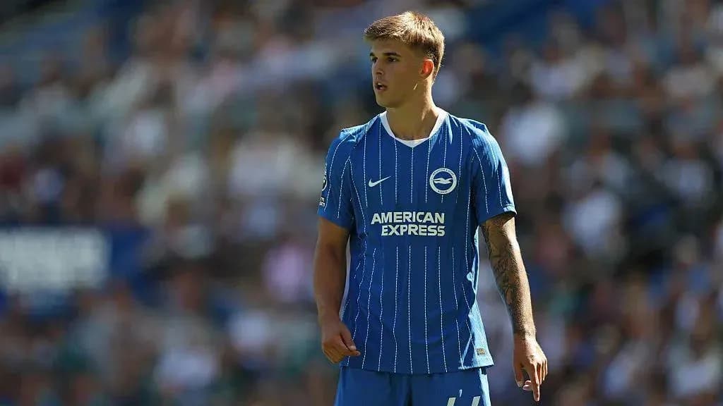 Player in blue Brighton kit on the pitch