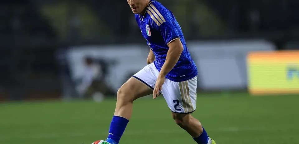 Player dribbling the ball during a match