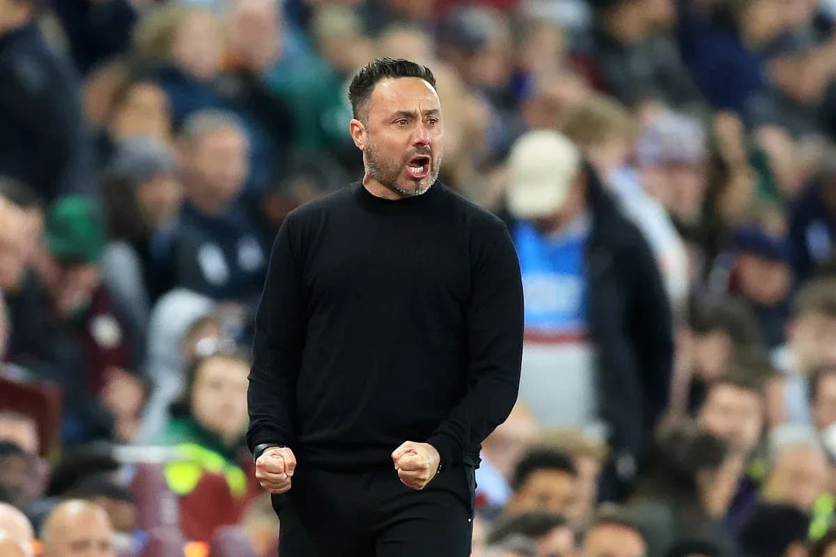 Coach celebrating passionately on the sidelines