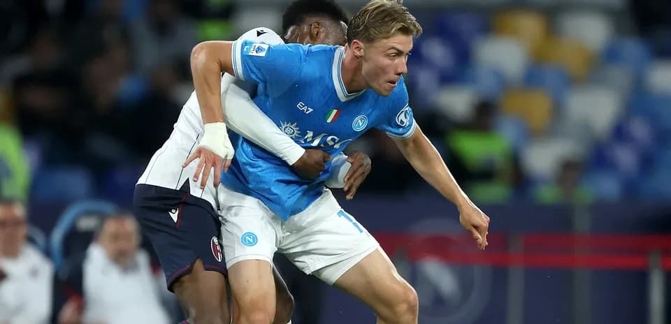 Napoli player challenged by opponent during match