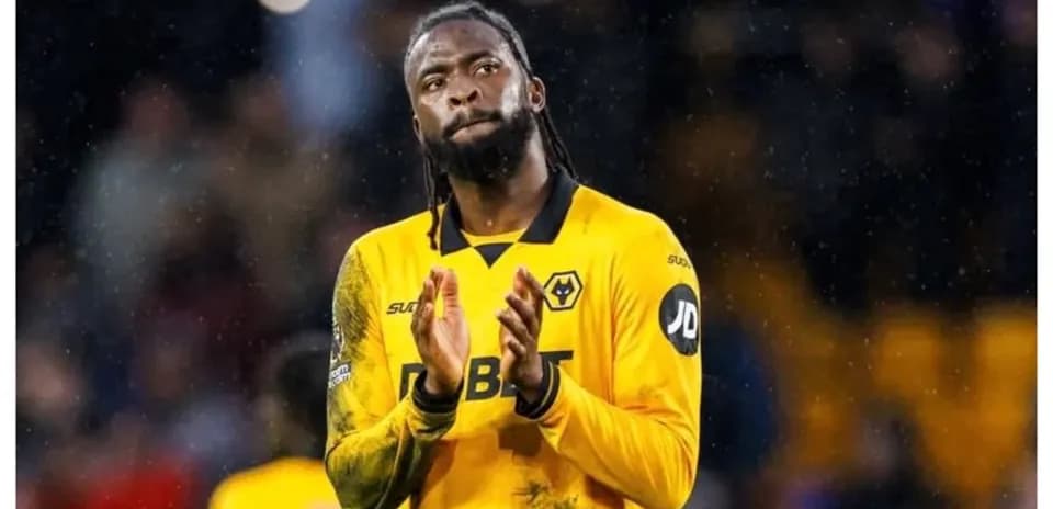 Player applauding fans in Wolverhampton Wanderers kit