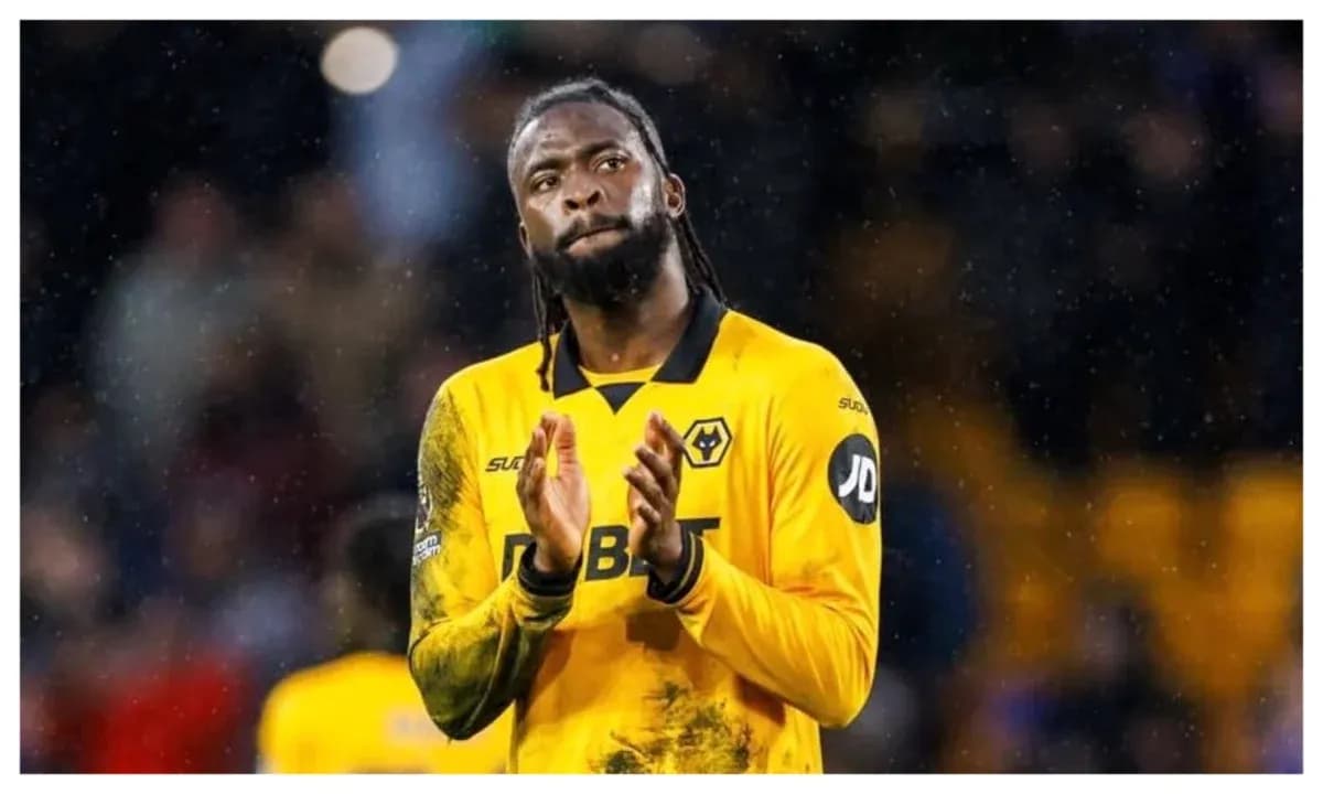 Player applauding fans in Wolverhampton Wanderers kit