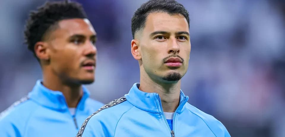 Two players in training kits during warm-up
