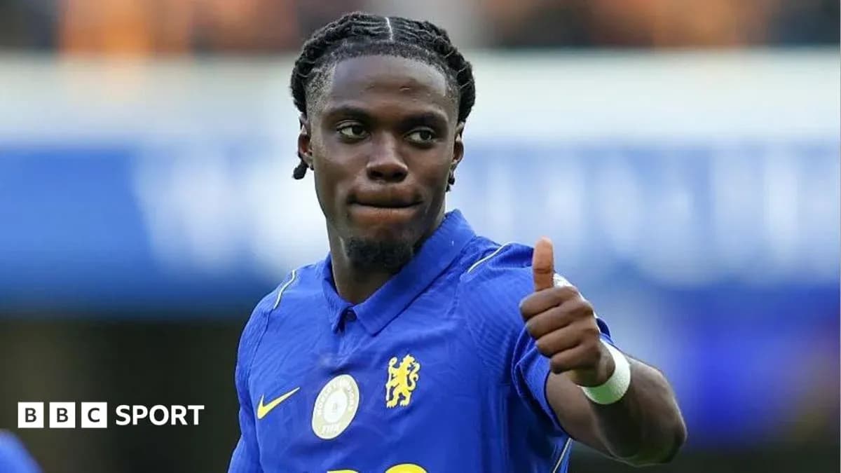 Player giving a thumbs up in Chelsea kit