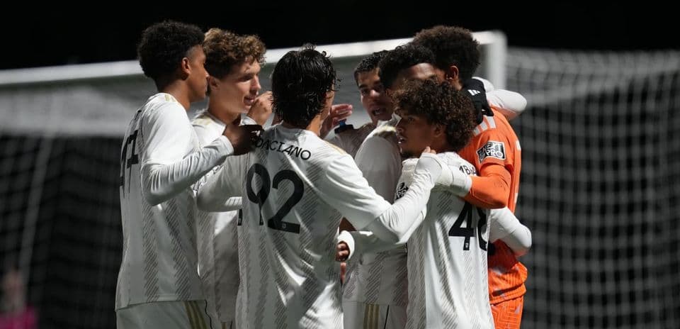Players celebrating a goal during MLS Next Pro match