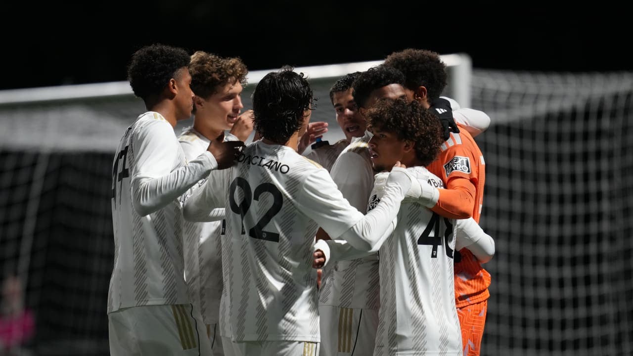 Players celebrating a goal during MLS Next Pro match