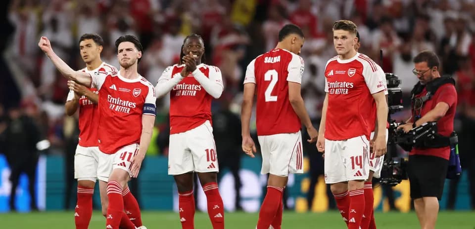Arsenal players celebrating after a match