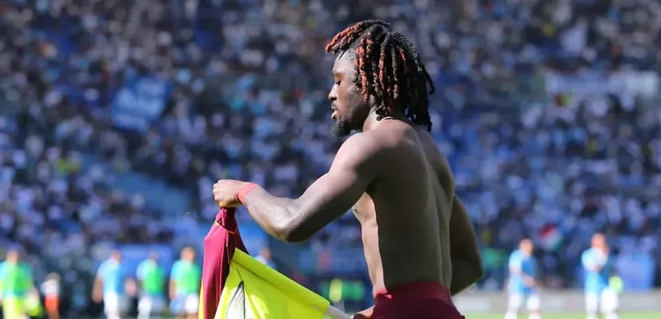 Player changing jersey during football match