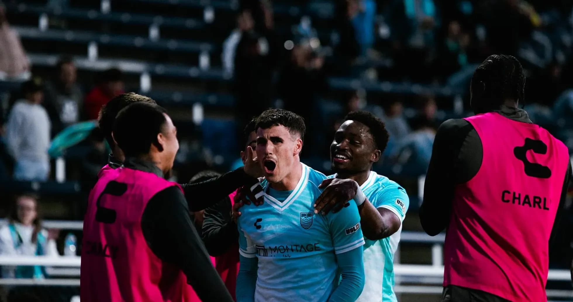 Monterey Bay players celebrating a goal