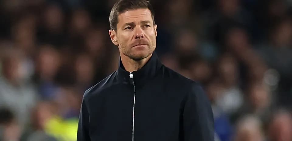Coach observing the match from the sideline