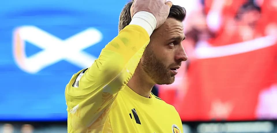 Goalkeeper looking concerned during match play