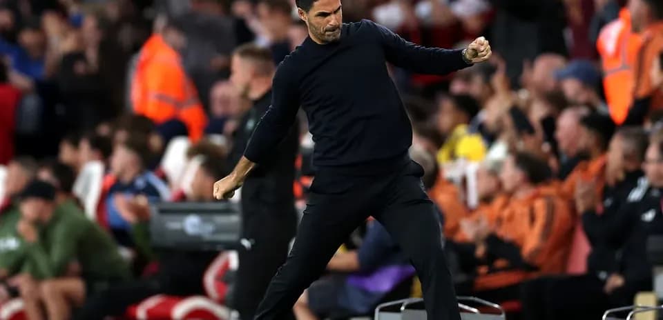 Manager celebrating a goal on the sideline