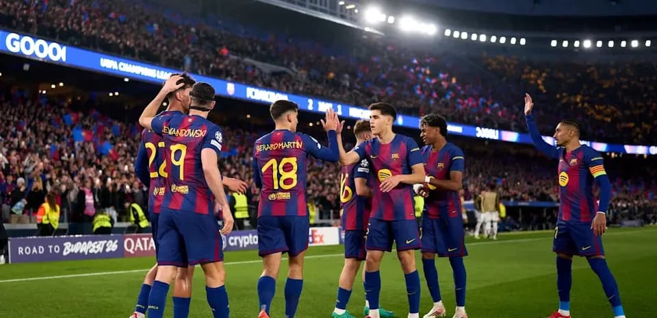 Barcelona players celebrating a goal in stadium