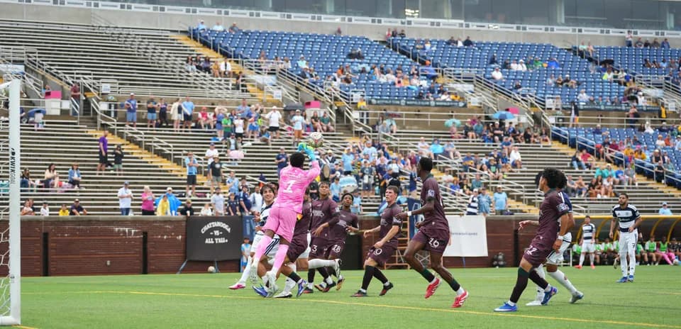 Goalkeeper making a save during the match